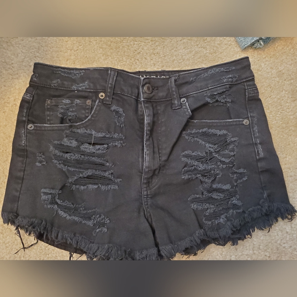 Black distressed high rise shorts. American Eagle  . Size 6. Stretch.